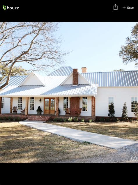 metal roof white farm houses|white house with galvalume roof.